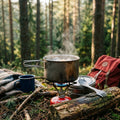 Titanium camping cookware cooking boiling water on an outdoor camp stove