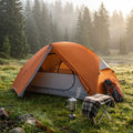 Sunset Orange TrailBlazer 2-person tent in misty pine forest