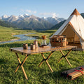 TerraWeave Camp Table Unfolded at green forest mountain campsite